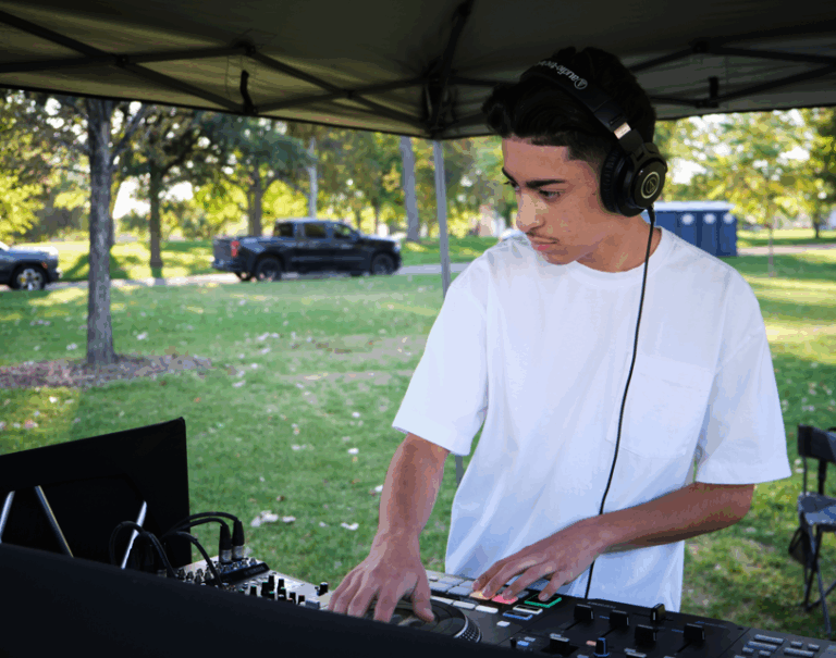 Student DJ plays music.