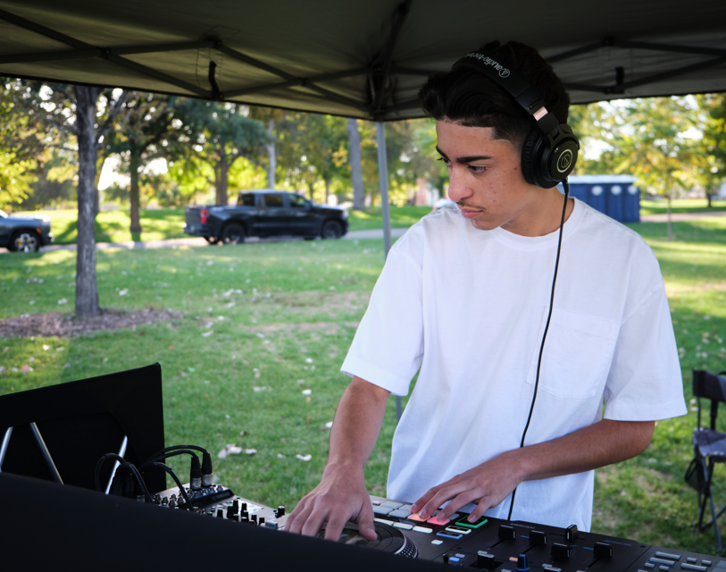 Student DJ plays music.