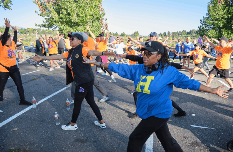 Participants stretch together before the Back to School 5K Fun Run.