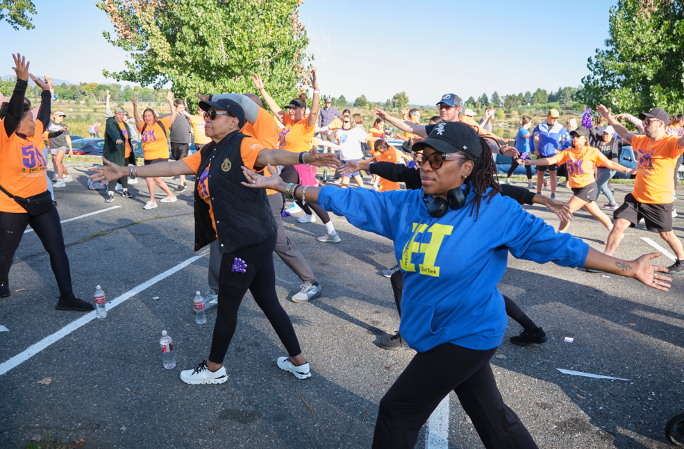 Participants stretch together before the Back to School 5K Fun Run.
