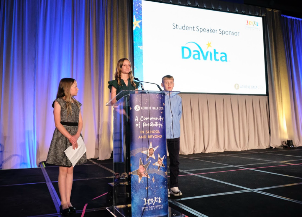 Three students speaking at podium during Achieve Gala 2026 program.